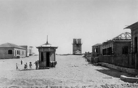 The first water tower in Tel Aviv (depicts Tel Aviv as sparse and empty, and demonstrating the 'modern successes' of early Zionist settlers). Photo by Avraham Soskin.